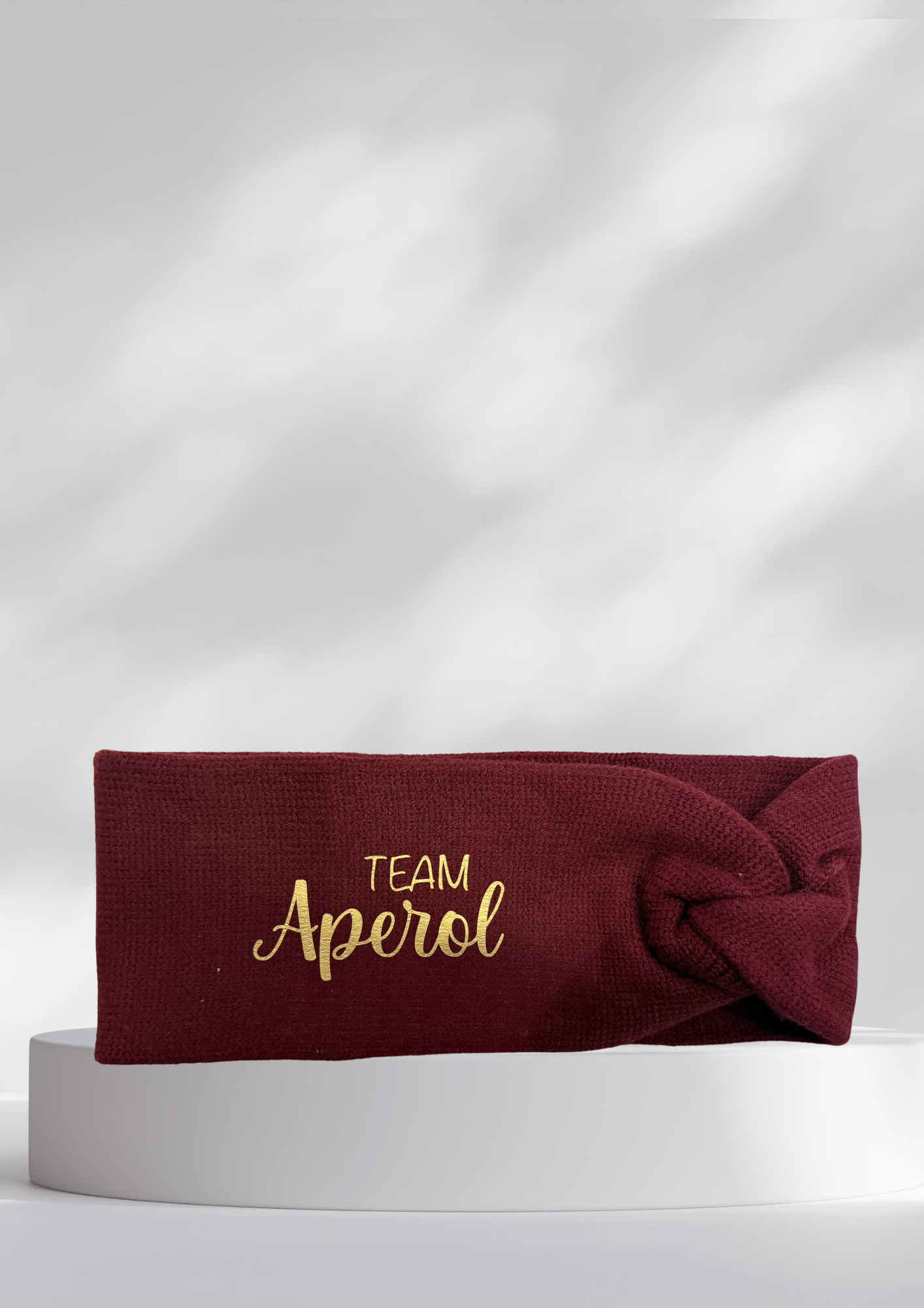 Stirnband mit Twist Knit - TEAM APEROL